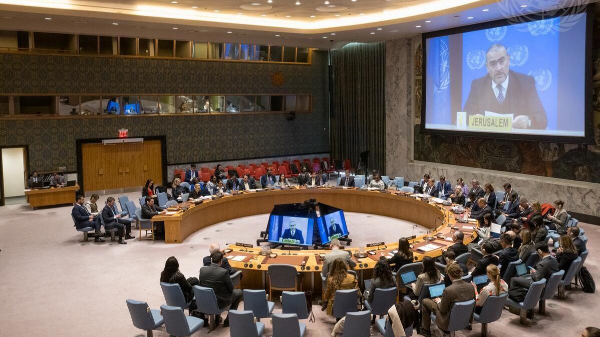 A wide view of the Security Council meeting on the situation in the Middle East, including the Palestinian question. On the screens are Ramiz Alakbarov, Deputy Special Coordinator for the Middle East Peace Process, United Nations Resident and Humanitarian Coordinator. [16 December 2025]