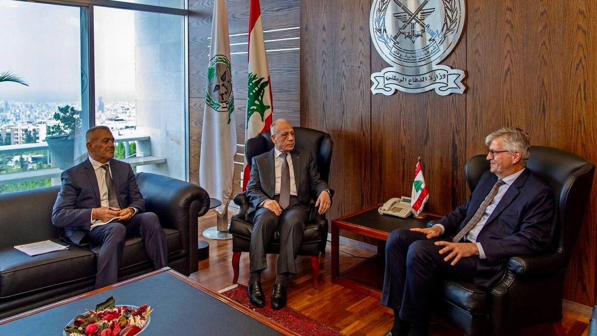 High level representatives attend a meeting.