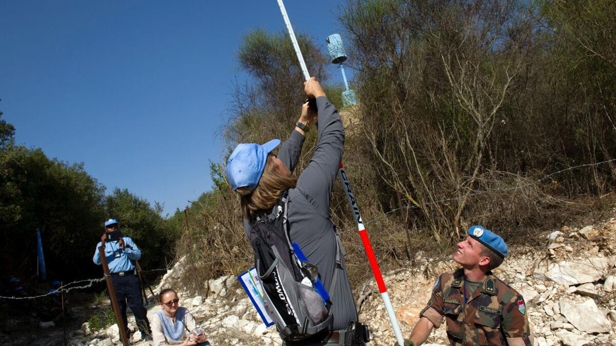 Peacekeepers assemble equipment.