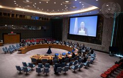 A wide view of the Security Council meeting on the situation in the Middle East, including the Palestinian question. On the screen is Tor Wennesland, Special Coordinator for the Middle East Peace Process. (27 September 2023 - UN Photo/Rick Bajornas)