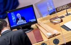 Tor Wennesland (on screen), Special Coordinator for the Middle East Peace Process, briefs the Security Council meeting on the situation in the Middle East, including the Palestinian question. 